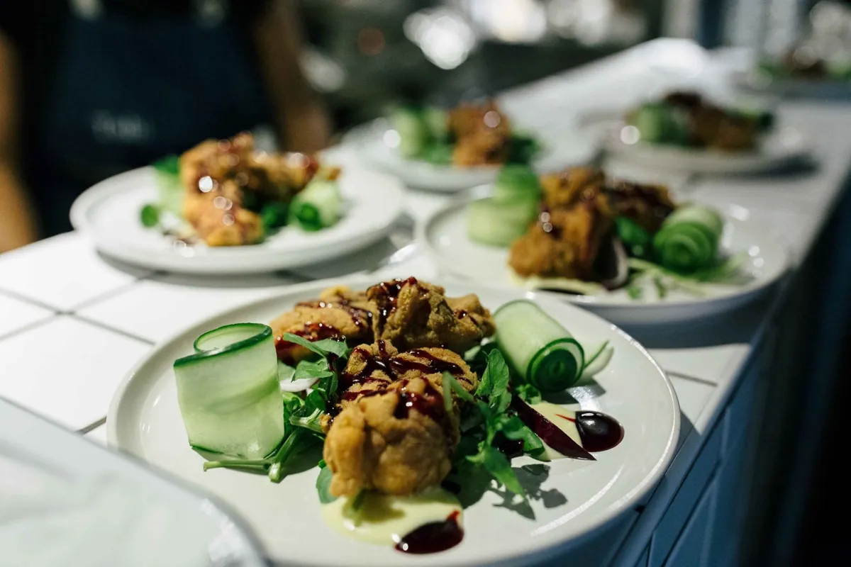 A row of plated starters waiting on the pass